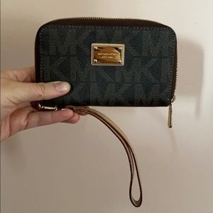 Lightly used MK wristlet for phone
